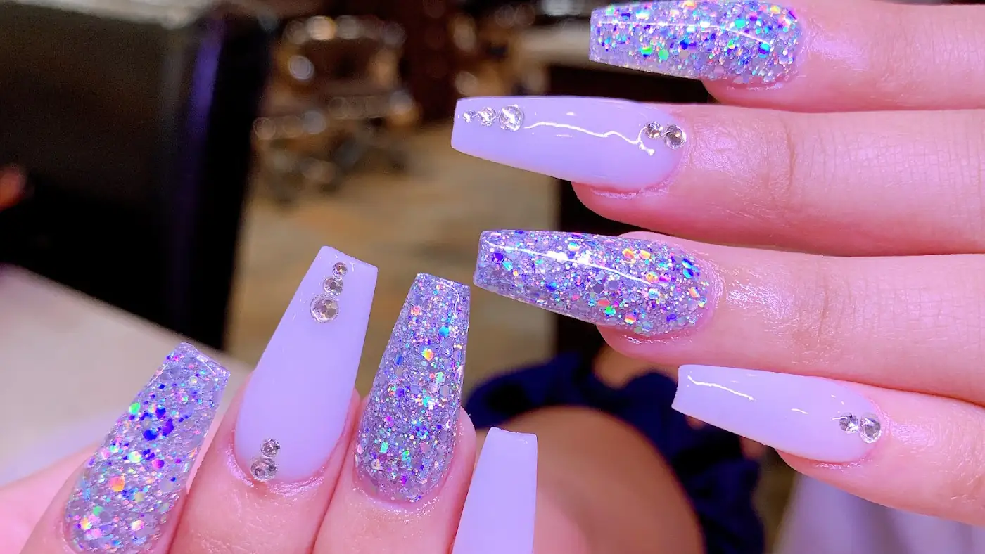 Lilac coffin nails with glitter and rhinestones at NT Nail Lab